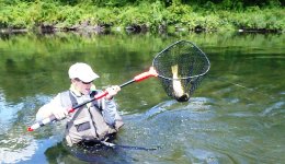 EJ netting my fish.JPG